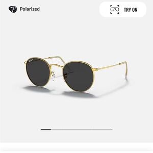 Ray bans: round metal… polished gold frame. Black lenses